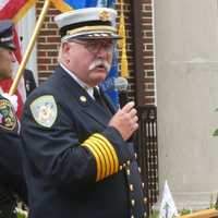 <p>New Canaan Fire Chief Jack Hennessey speaks during the 9/11 ceremony in New Canaan. </p>