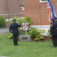 <p>A ceremonial wreath is placed during the New Canaan 9/11 ceremony.</p>