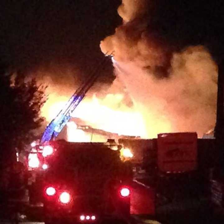 A five-alarm fire with explosions destroyed the warehouse buildings at 2059-2149 Seaview Ave. in Bridgeport. 