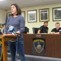 <p>Sgt. Kelly Connelly speaks at press conference announcing the arrest of a man who stole $100 in birthday money from autistic city resident Patrick Kogut, 27. Kogut is pictured between investigators Sgt. Paul Guzda, left, and Officer Frank Laconna.</p>