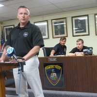 <p>Assistant Chief Timothy Shaw speaks during press conference announcing the arrest of a city man who stole $100 from autistic city resident Patrick Kogut, 27, last week. In back from left: Sgt. Paul Guzda, Kogut and Officer Frank Laccona.</p>