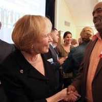 <p> Alana Sweeny, president and CEO, United Way of Westchester and Putnam, greets Larry Coleman, senior safety/materials supervisor, AkzoNobel, at United Ways Best Chefs and Fine Wines event.</p>