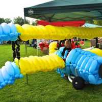 <p>An old-fashioned airplane made of balloons amused the kids at a previous Town Day.</p>