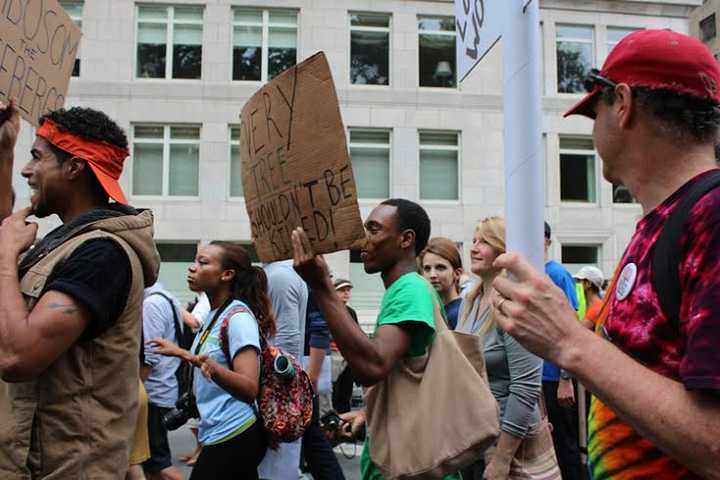 Pace University students gather together to walk in the climate march in New York City. 