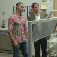 <p>Peter Tucci of Tucci Lumber Co. in Norwalk gives U.S. Rep. Jim Himes a tour of the facility where he makes 16,000 baseball bats per year.</p>