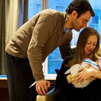 <p>Chelsea Clinton and her husband, Marc Mezvinsky, with their daughter Charlotte.</p>