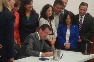 Malloy Signs New Law Aimed At Reducing Concussions Among Youth Athletes