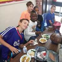 <p>Pocantico Schools students enjoy soup they made from their own harvest of vegetables.</p>