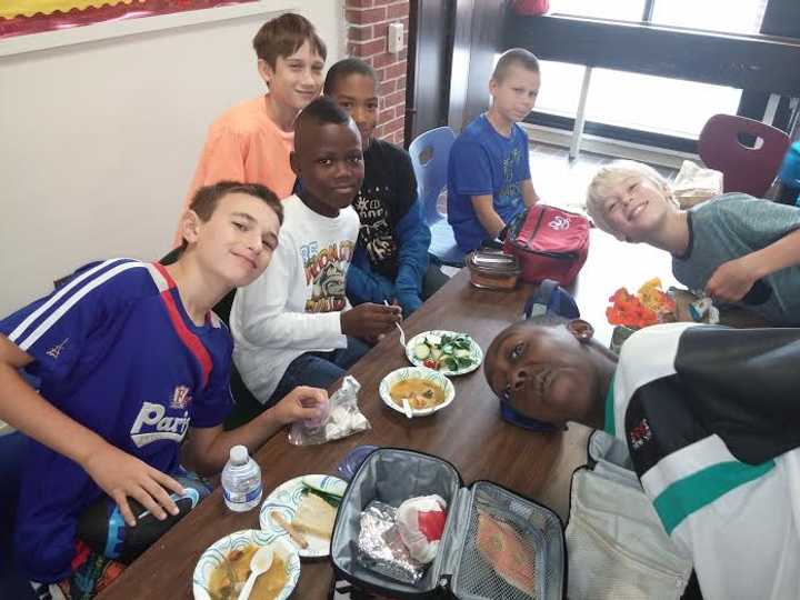 Pocantico Schools students enjoy soup they made from their own harvest of vegetables.