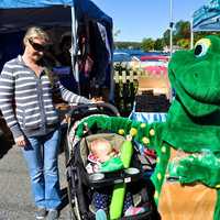 <p>Families and children join in on the street fair. </p>