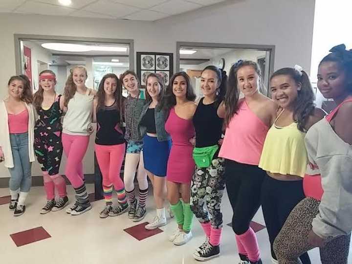 Seniors dressed in garb of the 80s and the MTV generation.