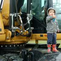 <p>A young man enjoys the up-close experience on a piece of construction equipment at KIDZFEST, a fundraiser by the Human Services Council of Norwalk to support Children&#x27;s Connection.</p>