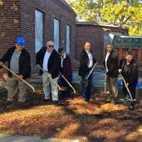 <p>(L to R) Developers and Tarrytown Board of Trustee members break ground at the site of the new pool and recreation facility on Oct. 10</p>