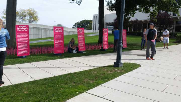 Students For Life hand out pamphlets in front of the Barone Campus Center at Fairfield University.