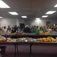 <p>Fifth-grade students sort food items.
</p>