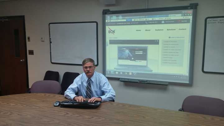 Deputy Chief of Police Chris Lyddy demos the CodeRED system in a conference room at Fairfield Police Headquarters, for the Daily Voice.