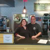 <p>Owners Jessica and Josh Tolk stand behind the counter of their newly acquired restaurant on Weston Avenue.</p>