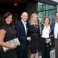 <p>Bronxville agents from Julia B. Fee Sotheby&#x27;s International Realty get ready for the mixer.</p>