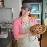 <p>Leisha Young, owner of Bridgeport&#x27;s Leisha&#x27;s Bakeria, with her Dutch apple pie.</p>