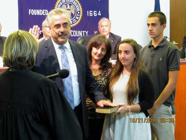 New Eastchester Town Justice Fred Salanitro being sworn in in front of the Board of Trustees on Tuesday.