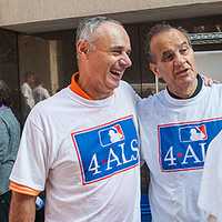 <p>Rob Manfred, left, and Joe Torre of Harrison at an MLB employee Ice Bucket Challenge on Aug. 20.</p>