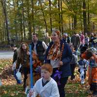 <p>Halloween parade marchers in Somers proceed from Route 100 to Bailey Park</p>