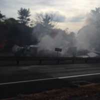 <p>The Greenwich Fire Department is putting out the truck fire on the Merritt Parkway.</p>