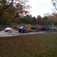 <p>The cleanup continues into the late afternoon in Greenwich. </p>