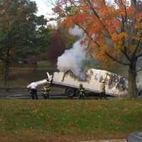 <p>The Greenwich Fire Department put out this truck fire in October 2014 after a truck collided with a Hutchinson River Parkway Bridge in Rye Brook, closing the adjoining Merritt Parkway.</p>