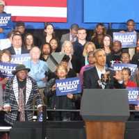 <p>President Barack Obama takes the stage at the far end of the gym at Bridgeport&#x27;s Central High School. </p>