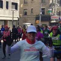 <p>Jenn Lewis of Wilton runs in Sunday&#x27;s TCS New York City Marathon.</p>