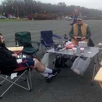 <p>This group of Chick-Fil-A fans donned sunglasses and declined to be identified -- because they called in sick to work to join the line. </p>