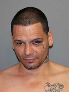 Norwalk Man Charged In Assault On Store Clerk, Spitting At Police