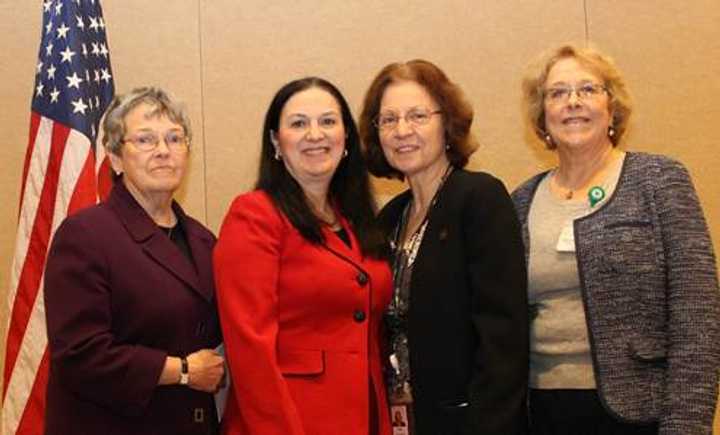 Directors from the four sponsoring hospices honor local veterans. From left, Mary K. Spengler&#x27; Renee Levesque,Rose Rosenberg and Wanda Orton.