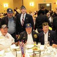 <p>Vito Pinto, director of the Westchester County Office of Veterans Affairs, top right, joins local veterans at breakfast in honor of Veterans Recognition Month.</p>