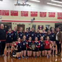 <p>The Kennedy Catholic varsity volleyball team poses for a team picture with the plaque after winning the CHSAA City Championship on Saturday, Nov. 8.</p>