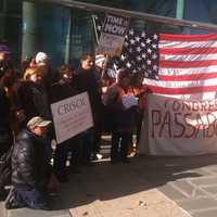 <p>Immigration activists gathered Friday, Nov. 21, in front of the Government Center to celebrate President Barack Obama&#x27;s recent executive order.</p>