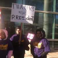 <p>An immigration activist holds a sign thanking President Barack Obama for his executive order helping 5 million undocumented immigrants to legally live and work in the U.S.</p>