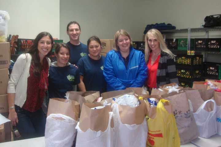 Volunteers At Norwalk's Person-To-Person Pack Up Thanksgiving Meals 