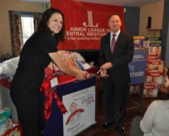 Westchester County Executive Robert P. Astorino, right, joins with Nikki Hahn, president of the Junior League of Central Westchester, to officially open the Westchester County Diaper Bank in Scarsdale.