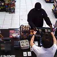 <p>Police are seeking help identifying the suspects in this photos, who robbed a gas station at gunpoint Tuesday.</p>
