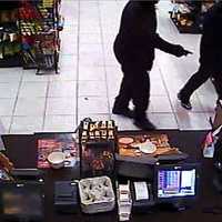 <p>The suspects were described as two black men, wearing dark clothes and with their faces covered.</p>