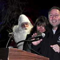 <p>Westchester County Executive Rob Astorino talks briefly to the crowds before flipping the lightswitch.</p>