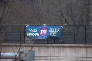 Banner On I-287 Makes Reference To Killing By Police