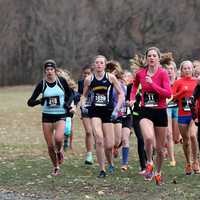 <p>Staples&#x27; Hannah DeBalsi, No. 22 in blue, runs with the leaders Saturday at the FootLocker Northeast Regional championships on Saturday in New York.</p>