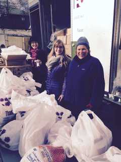 Junior League Of Bronxville Helps Distribute Turkeys