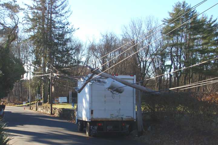 Truck Snaps Utility Pole In Westport