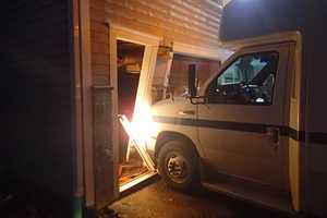 Van Crashes Into Westport Garage
