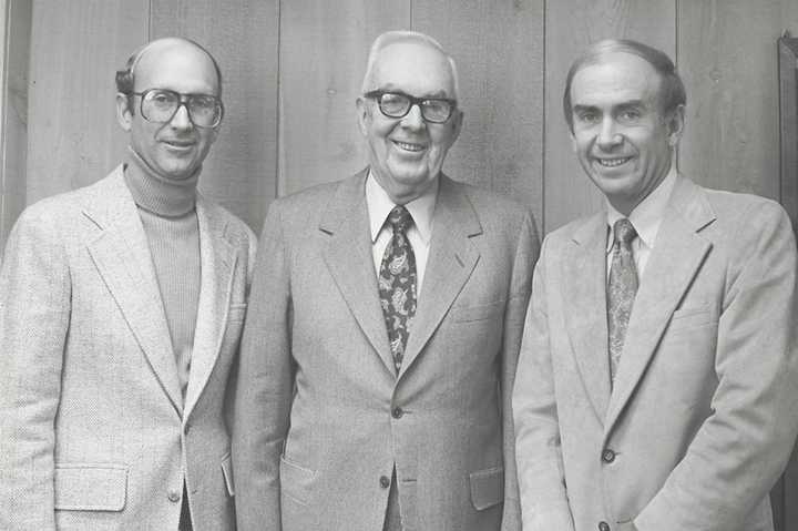 Bill Mitchell, left, stands with his father, Ed, center, and brother Jack. Ed Mitchell, who founded the business with his wife, Norma, in 1958.