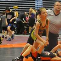 <p>Myles Griffin leaves the mat after winning a New York state championship.</p>